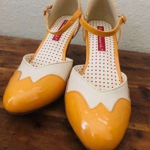 Yellow wing tip kitten heel bait footwear heel